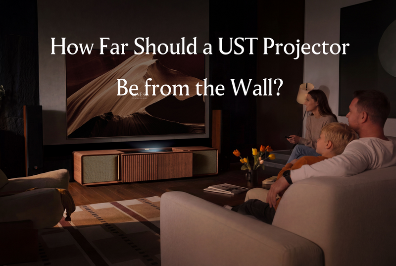 Family watching a large screen above a UST projector cabinet, showing wall distance and furniture placement in an ultra short throw projector setup.