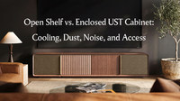 UST projector cabinet in a modern living room comparing open shelf and enclosed cabinet designs for cooling, dust protection, and noise reduction