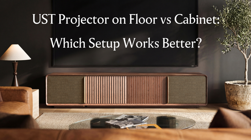 Wooden UST projector cabinet beneath a large screen, introducing a floor vs cabinet comparison for ultra short throw projector placement.