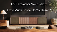 Wooden UST projector cabinet beneath a large screen in a modern living room, introducing projector ventilation and space requirements for enclosed home theater equipment.