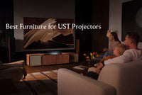 Family watching a large screen in a living room with a UST projector cabinet, illustrating furniture options for a clean home theater setup.