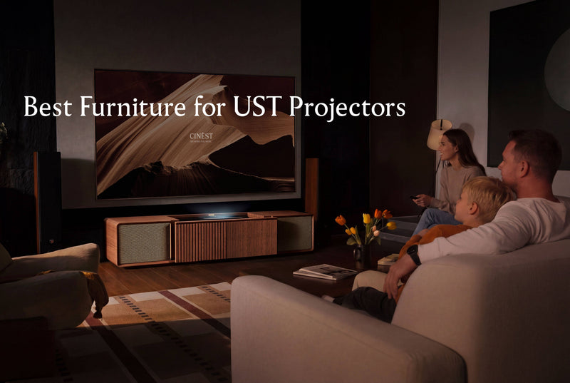 Family watching a large screen in a living room with a UST projector cabinet, illustrating furniture options for a clean home theater setup.